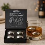 Men's Republic Footy Ball ice cubes set with four stainless steel balls for chilling drinks, displayed on a clear surface.