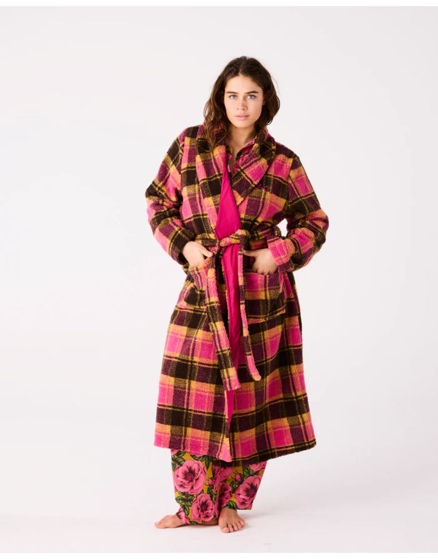 Kip & Co Alaskan adult sherpa robe in cozy, plush fabric with a relaxed fit and hood, displayed on a hanger.