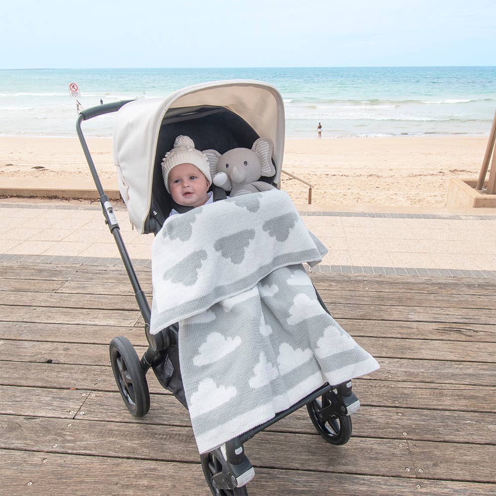 Living Textiles Mason the Elephant knitted toy with soft gray yarn and embroidered facial features, perfect for cuddling and play.