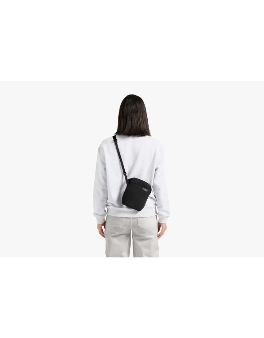 Bellroy City Pouch in Saltbush color, a compact bag with multiple compartments for organizing essentials, made of durable material.