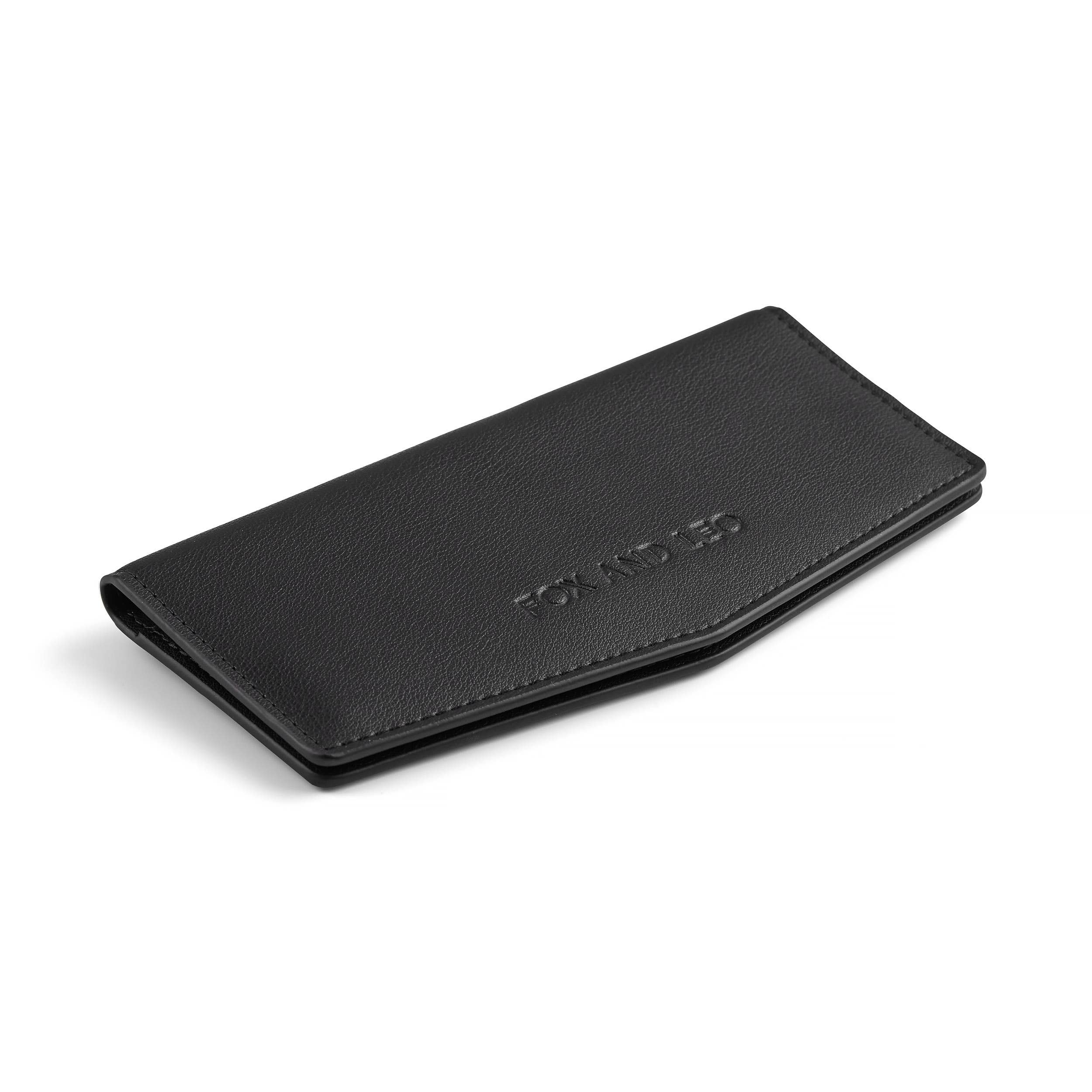 Black Fox & Leo Swallet pendant featuring a sleek design with silver and black accents, displayed on a neutral background.