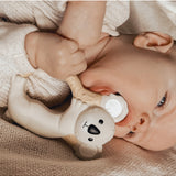 Winnie Parkes Banks the Koala teething ring with soft silicone and plush fabric, designed for babies to chew and soothe gums.