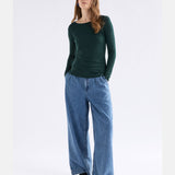 Elk Merino long sleeve top in dark pine, made from soft, breathable wool for outdoor and everyday wear.