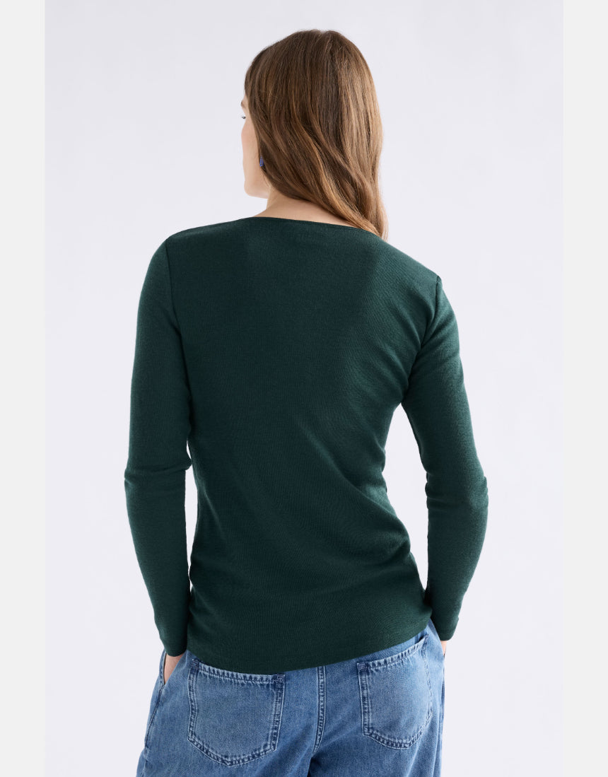 Elk Merino Long Sleeve Top in Dark Pine, soft wool clothing with a fitted design and crew neckline, ideal for layering.