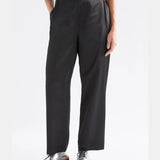 Black Elk Este Pant showing a slim fit design with waistband and front pockets, made from comfortable fabric.