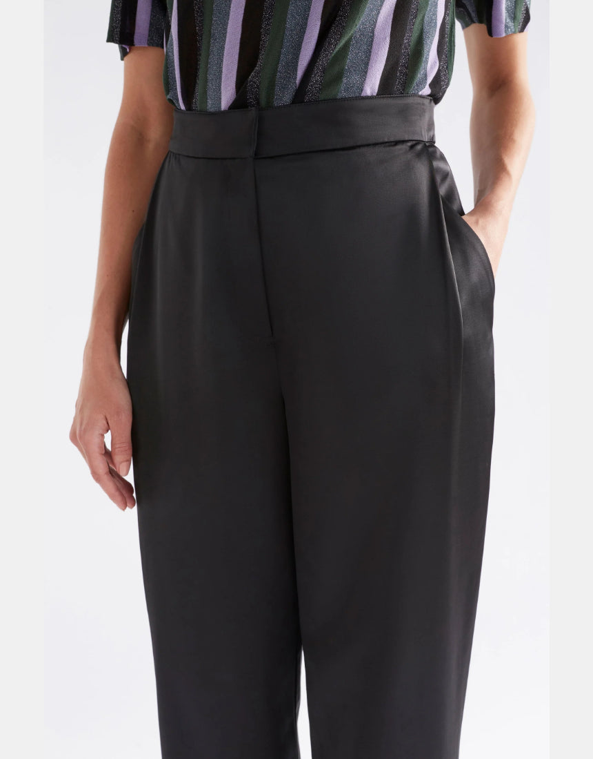 Black Elk Este Pant shown on a model, featuring a sleek, modern design with comfortable fit and stylish details.