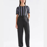 Black Elk Este Pant, stylish men's pants with a tailored fit, made by Elk, shown on a neutral background.