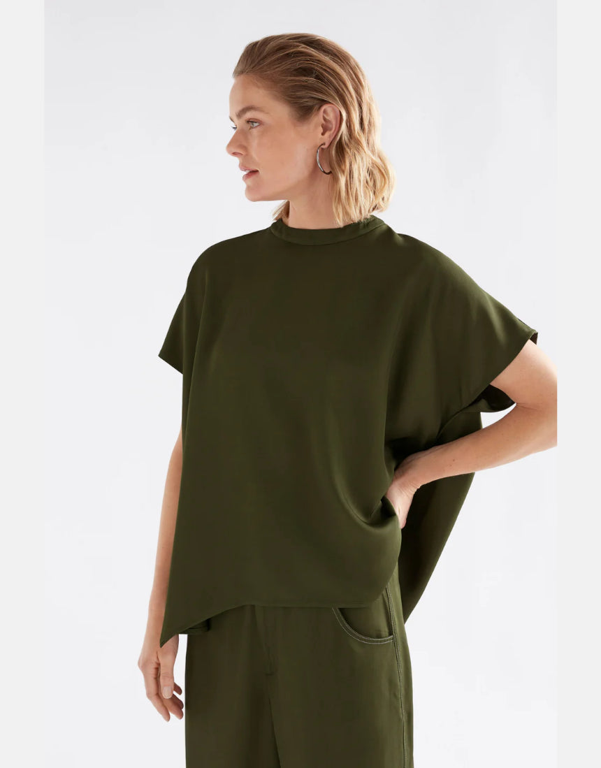 Elk Hullu Top in bright olive, a stylish women's clothing piece featuring a relaxed fit and comfortable fabric.