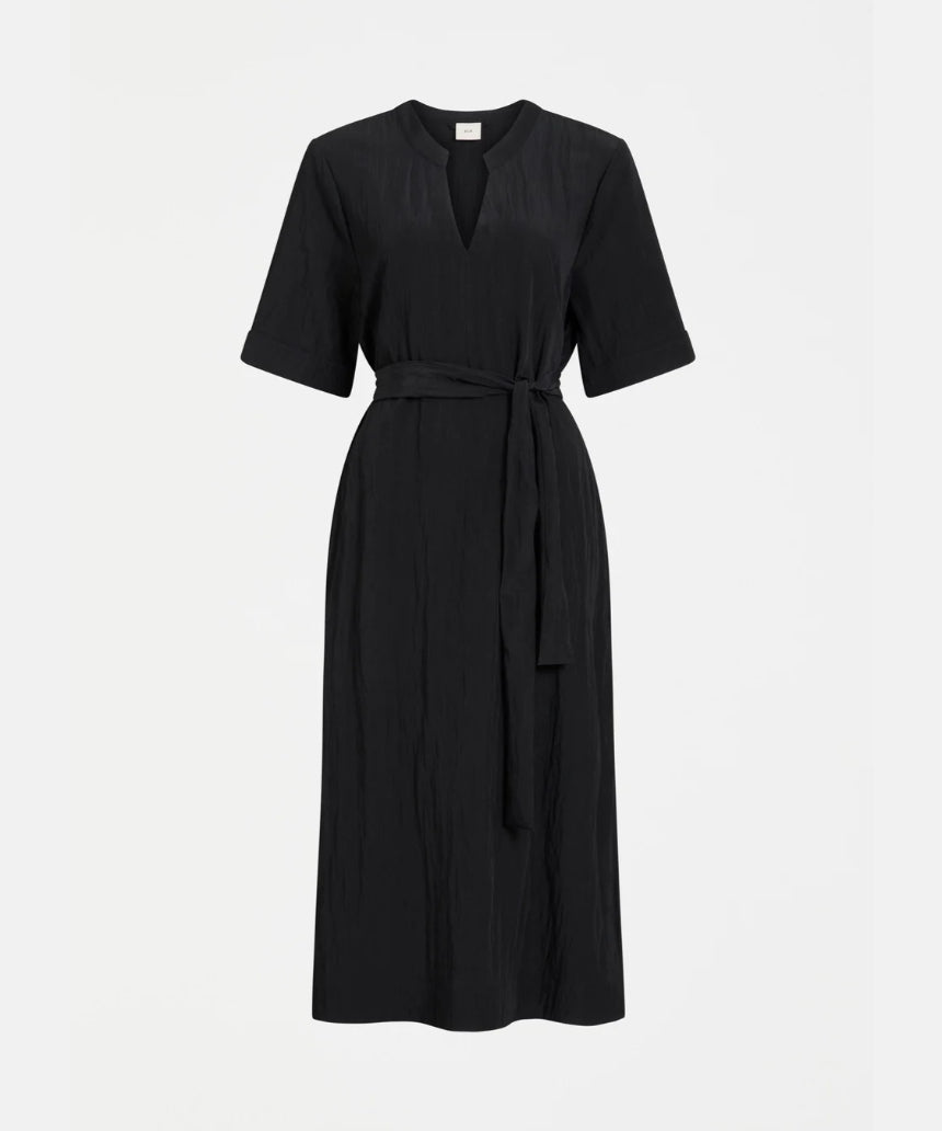 Black Elk Kysten Dress, a stylish women's clothing item with a relaxed fit, displayed on a hanger.