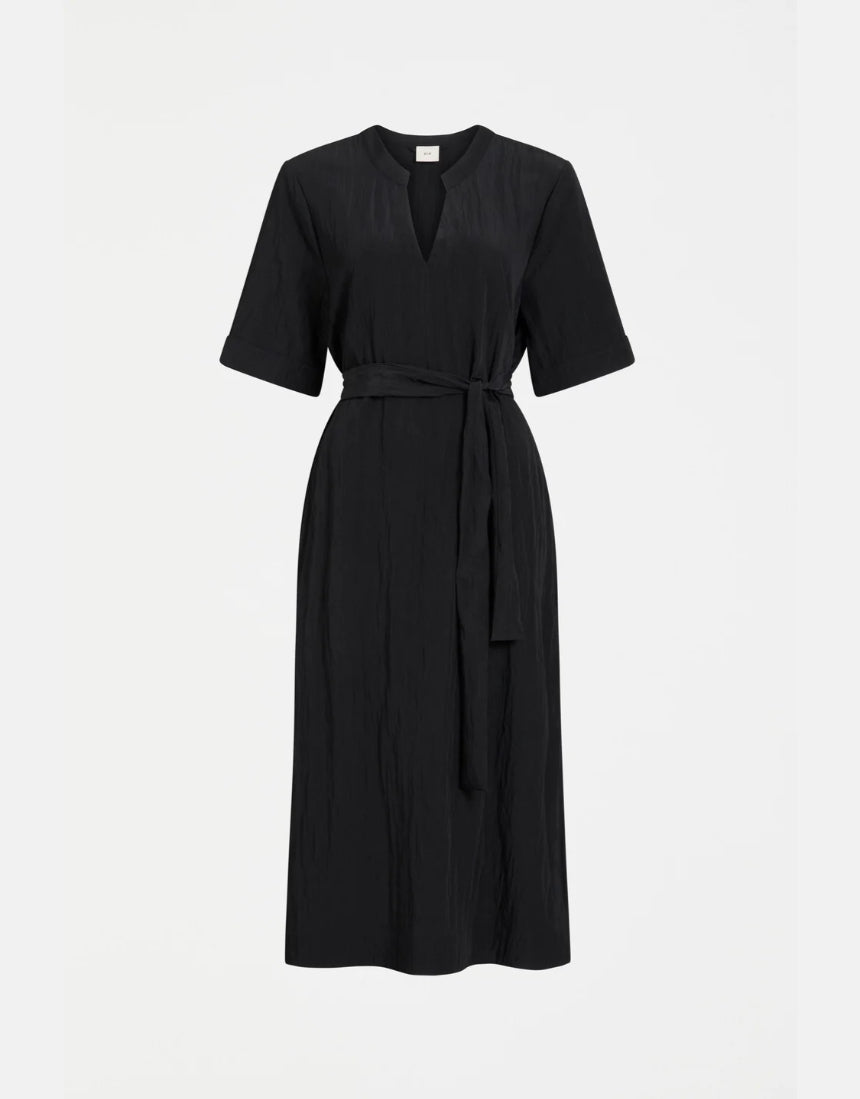 Black Elk Kysten Dress, a stylish women's clothing item with a relaxed fit, displayed on a hanger.
