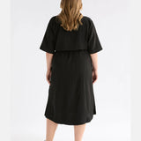 Black Elk Kysten Dress, stylish women's clothing with flowy fabric and elegant design, shown on a model.