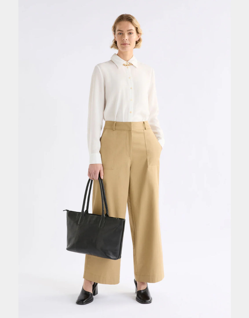 Elk Kudel Pant in almond color, stylish clothing with a relaxed fit and tapered design, made from comfortable fabric.