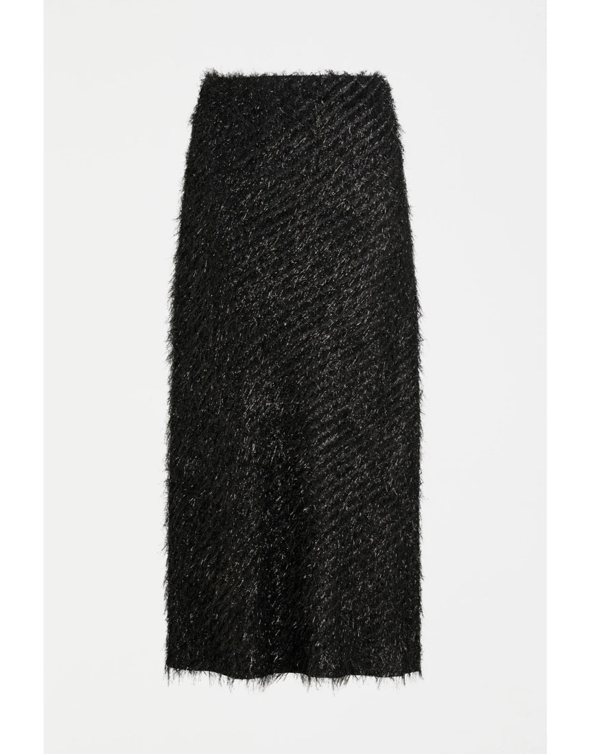 Black Elk Ilta Skirt displayed on a hanger, featuring a stylish, flowy design perfect for casual or dressy occasions.