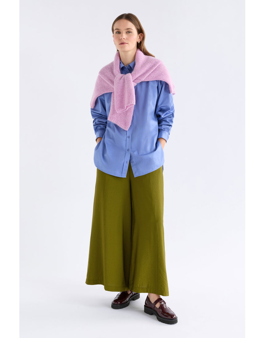 ELK The Label Sol Shirt in Dusk Blue, a stylish blue tops with a relaxed fit, shown on a model.