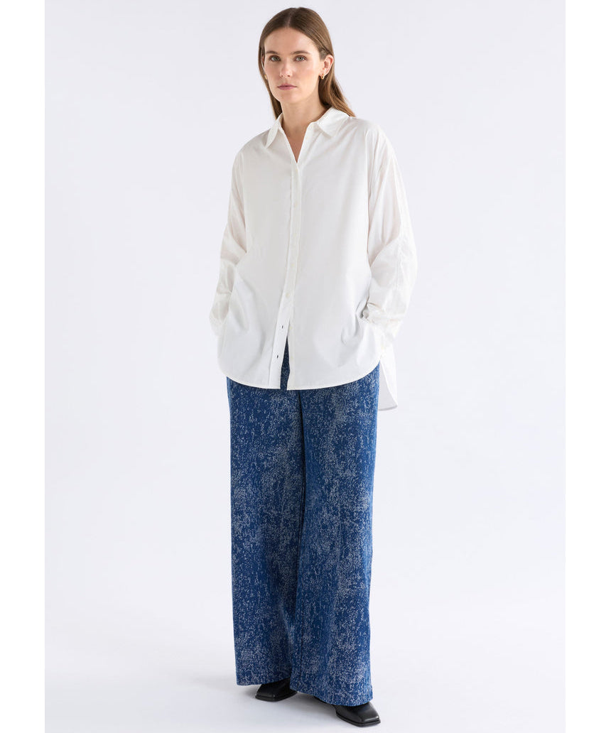 White Elk Sol Shirt from ELK The Label, a stylish women's top with a relaxed fit and minimal design.