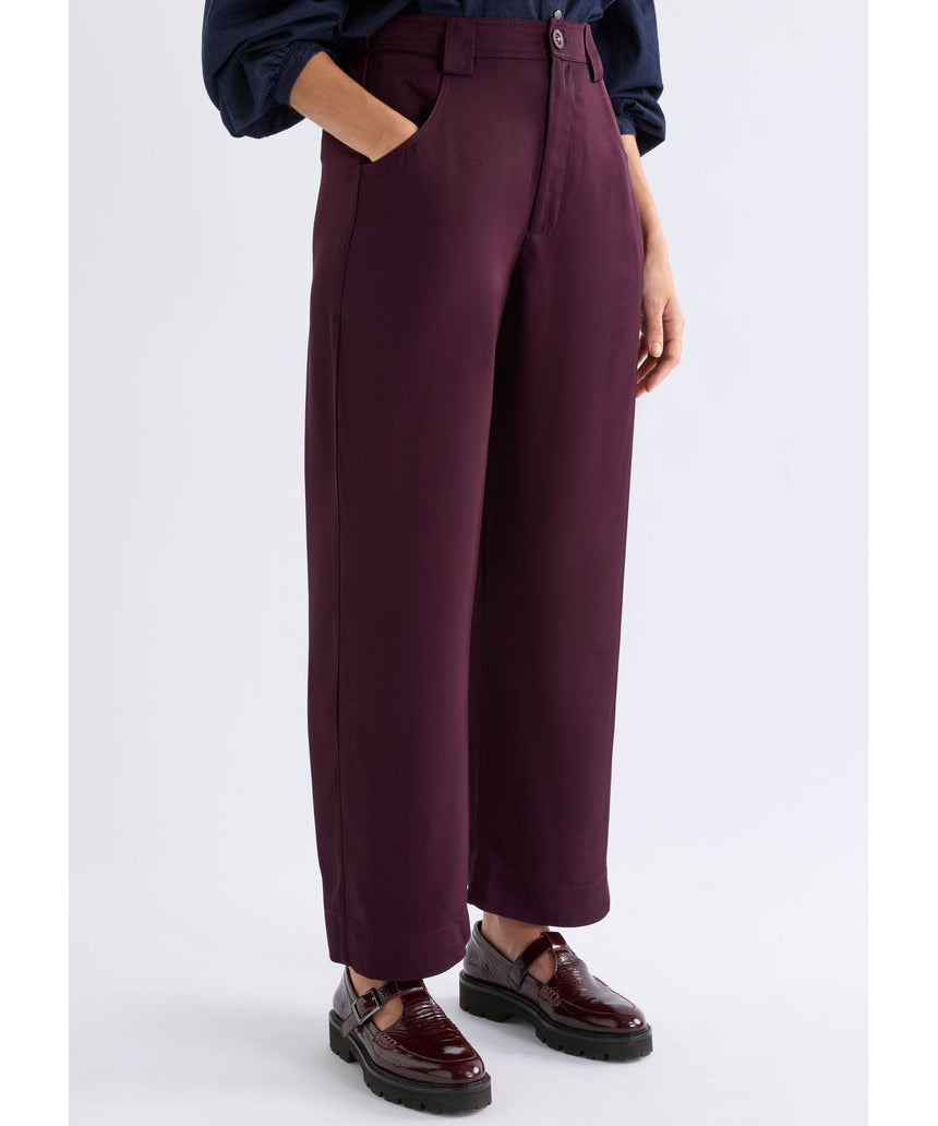 ELK The Label Hullu Pant in Shiraz color, stylish pants with a relaxed fit, shown on a model against a neutral background.