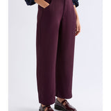 ELK The Label Hullu Pant in Shiraz color, stylish pants with a relaxed fit, shown on a model against a neutral background.