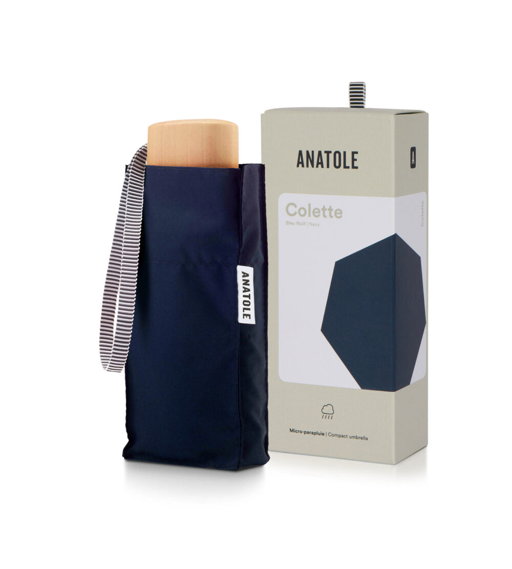 Anatole Colette micro-umbrella in navy blue, compact umbrella with a sleek design and sturdy handle.