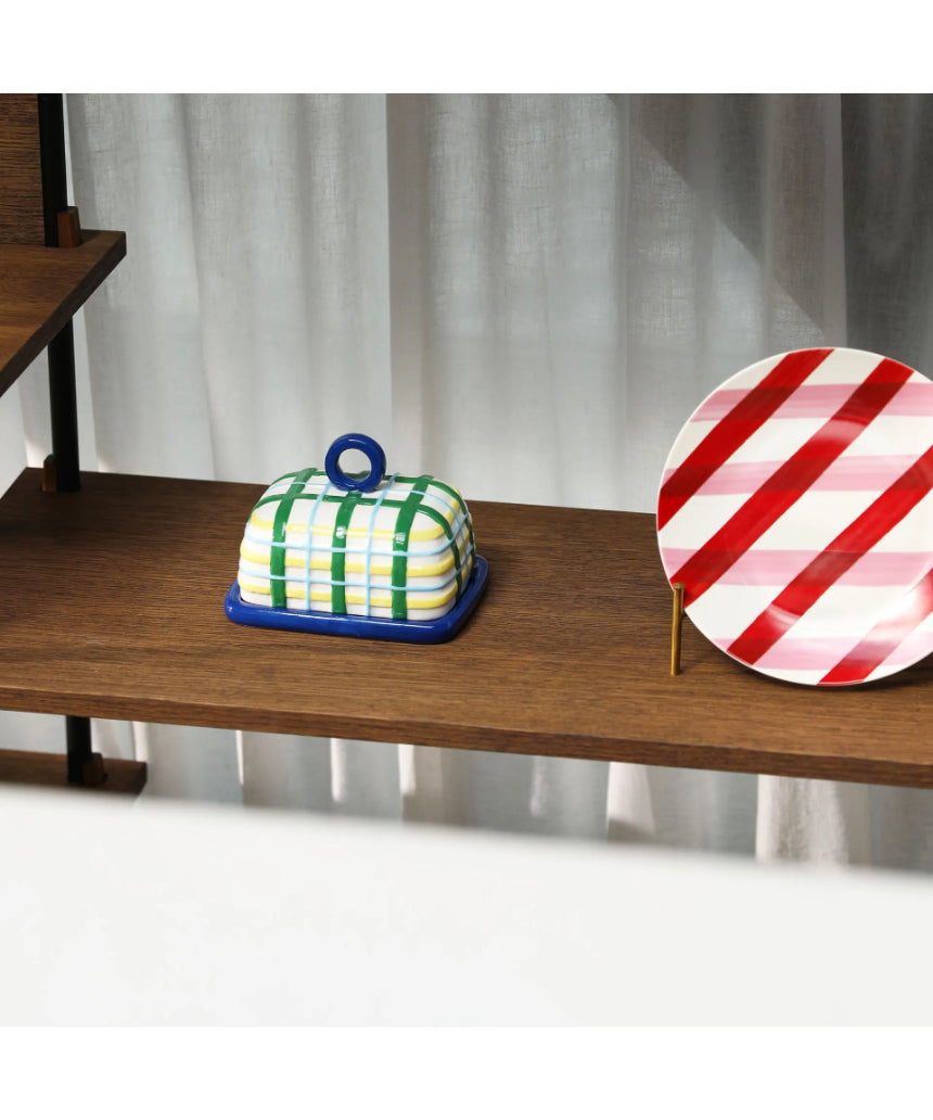 Klevering butter dish with plaid blue design, featuring a sleek ceramic container for serving and storing butter.