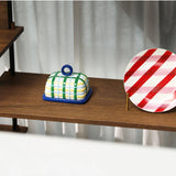 Klevering butter dish with plaid blue design, featuring a sleek ceramic container for serving and storing butter.