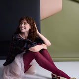 Aran Cashmere Blend Tights by Tightology in claret color, featuring a close-up of the soft, textured knit fabric and snug fit.