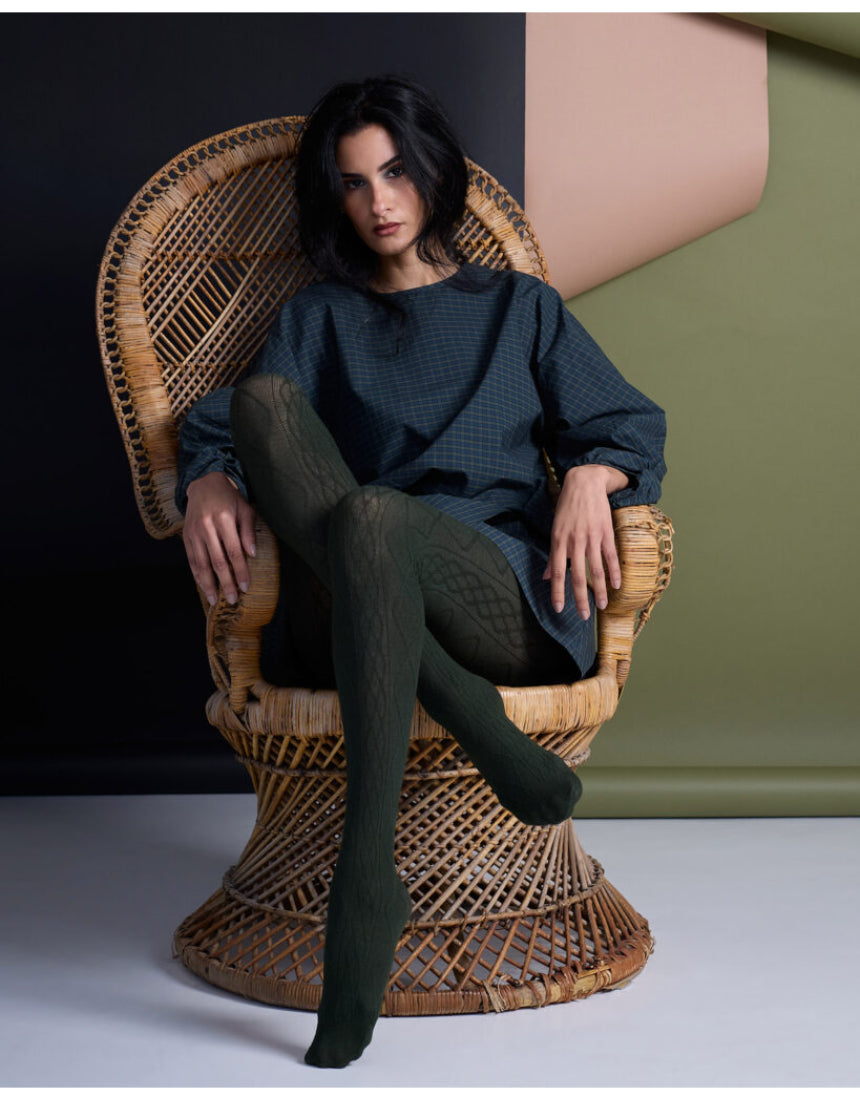 Green Aran Cashmere Blend Tights by Tightology, close-up of soft, cozy knit fabric with a textured pattern.