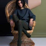 Green Aran Cashmere Blend Tights by Tightology, close-up of soft, cozy knit fabric with a textured pattern.