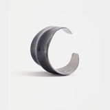 Elk Illsta Cuff bracelet in bright navy with sleek metal design, showcasing its modern and stylish accessory appearance.