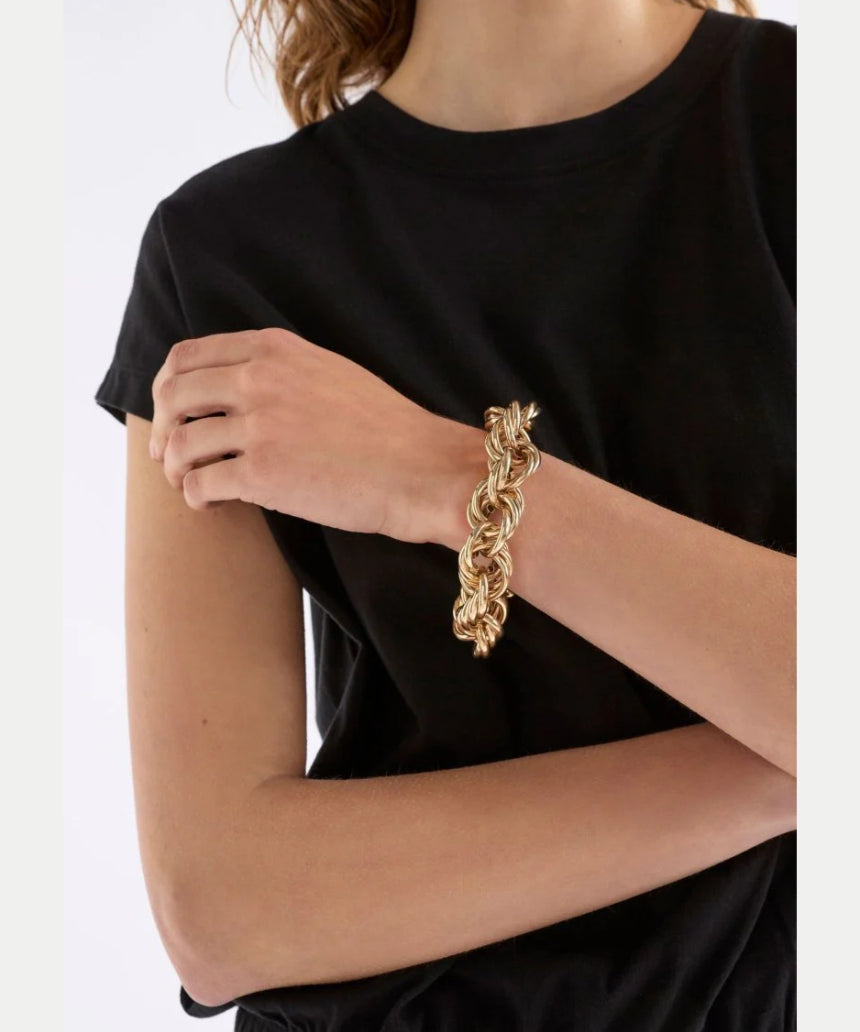 Elk Reppen bracelet in silver with a sleek, minimalist design featuring smooth, polished metal and subtle detailing.