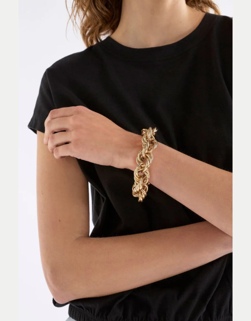 Elk Reppen bracelet in silver with a sleek, minimalist design featuring smooth, polished metal and subtle detailing.