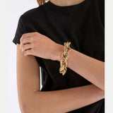 Elk Reppen bracelet in silver with a sleek, minimalist design featuring smooth, polished metal and subtle detailing.