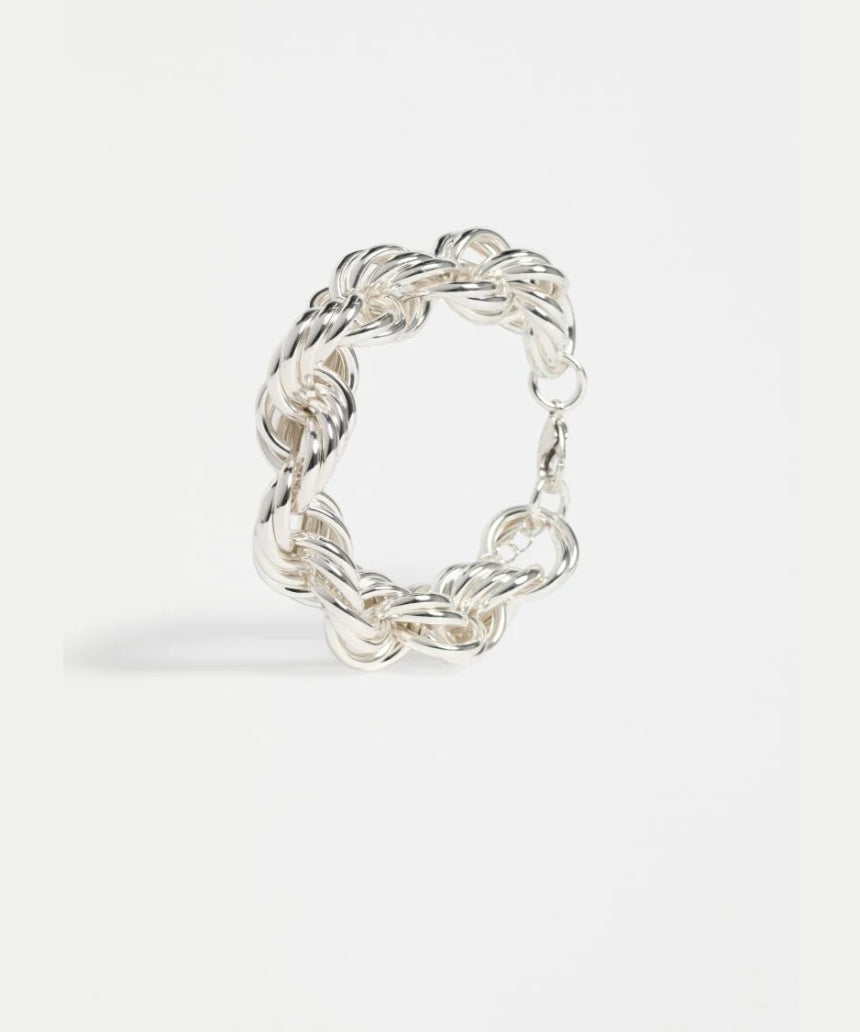 Elk silver Reppen bracelet featuring a sleek, modern bangle design in polished silver.