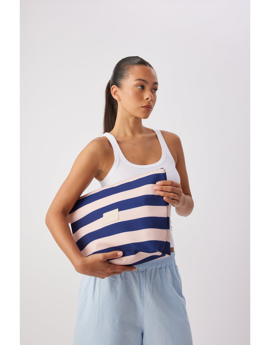 Large wet base with Regatta Stripe by Base, featuring colorful striped pattern and sturdy design for water sports equipment.
