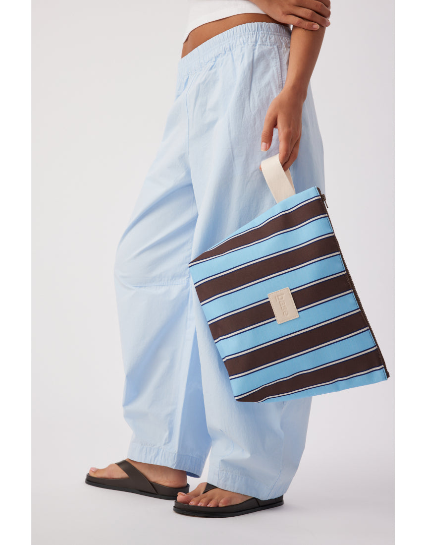 Large wet base with chocolate stripe from Base, showcasing a soft, textured surface in a close-up view.