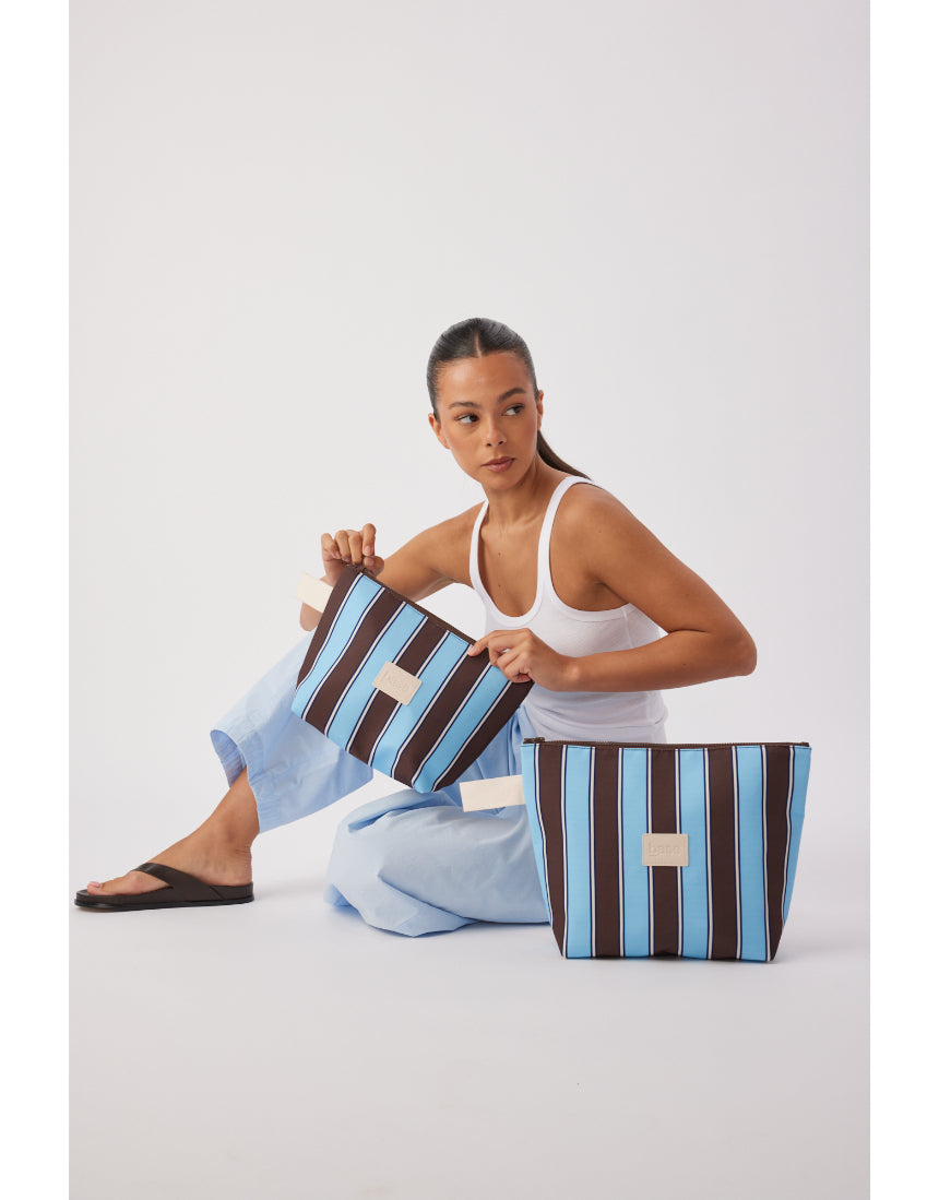 Large wet base with chocolate stripe by Base, featuring a sleek, modern design perfect for contemporary decor.