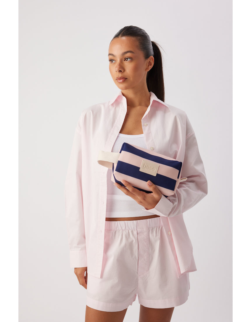 Base Ditty Base in Regatta Stripe, a stylish surfboard base with a colorful striped design, suitable for secure surfboard mounting.