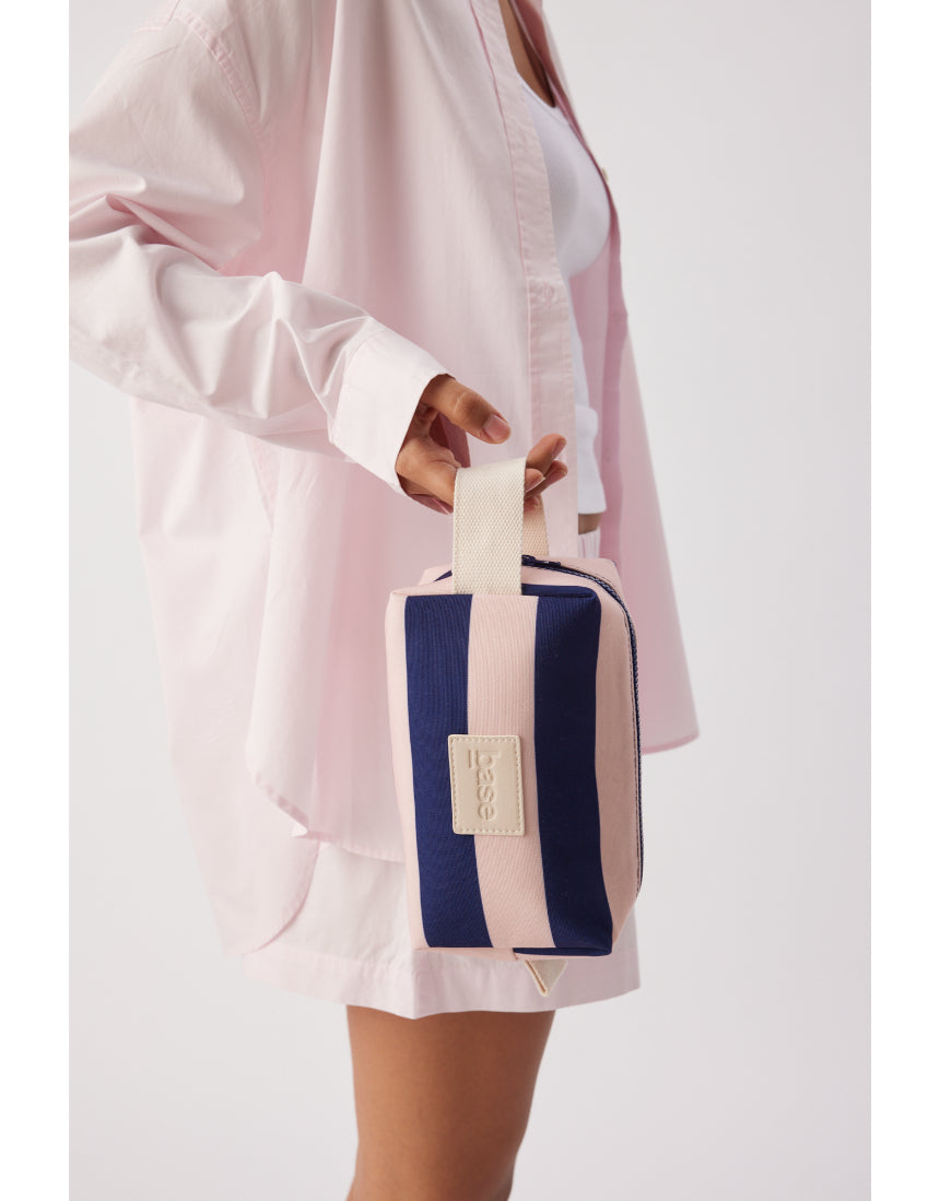 Base Ditty Base in Regatta Stripe featuring a colorful, patterned fabric with a nautical-inspired design and vibrant stripes.