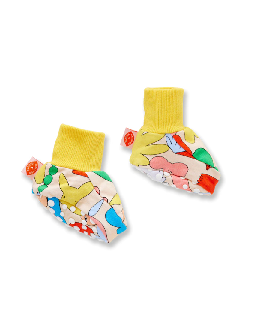 Halcyon Nights Little Billabong baby booties in soft fabric, featuring playful animal patterns and snug fit for little feet.