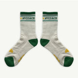 Banabae organic cotton crew socks featuring Coach branding, soft and comfortable with a stylish design.