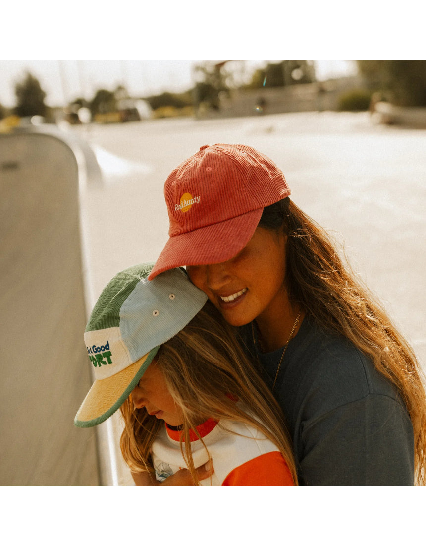 Banabae Rad Aunty Cord Cap in eco red, featuring a casual, stylish design with a curved brim and adjustable strap.