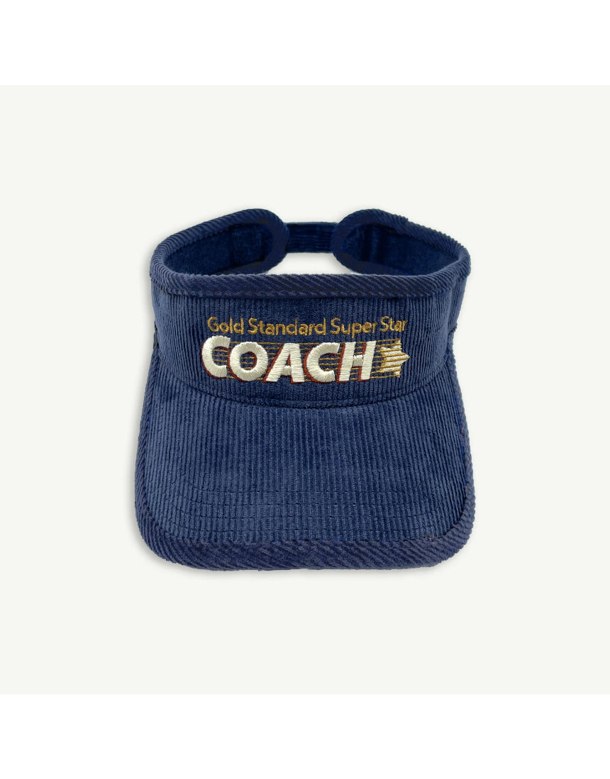 Banabae Super Star Coach Visor with wide brim and adjustable strap, featuring stylish black design and logo details.