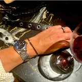 Salty Safari Oslo bracelet featuring nautical-inspired design with beads and charms in a natural color palette.
