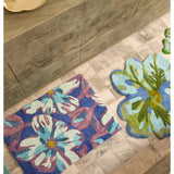 Blue Dutch floral bath mat by Bonnie and Neil, featuring a charming floral pattern, perfect for bathroom decor.