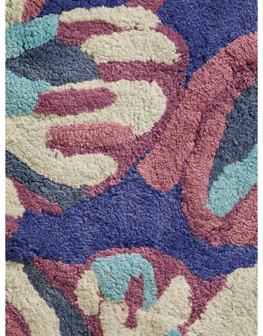 Blue floral bath mat by Bonnie and Neil with Dutch-inspired design, perfect for adding a decorative touch to bathroom floors.