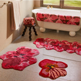 Pink long bath mat by Bonnie and Neil featuring a soft, textured design with a floral pansy pattern.