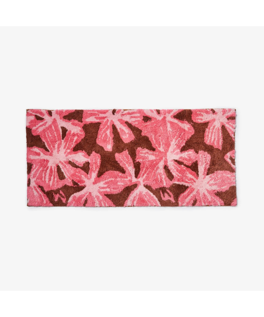 Pink cotton long bath mat from Bonnie and Neil, featuring a soft, plush design perfect for bathroom decor.