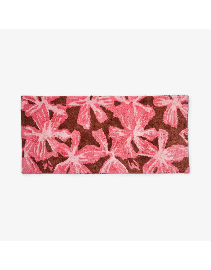 Pink cotton long bath mat from Bonnie and Neil, featuring a soft, plush design perfect for bathroom decor.