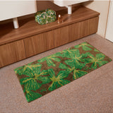 Bonnie and Neil Mave Khaki cotton bath mat with textured design, shown in a bathroom setting.