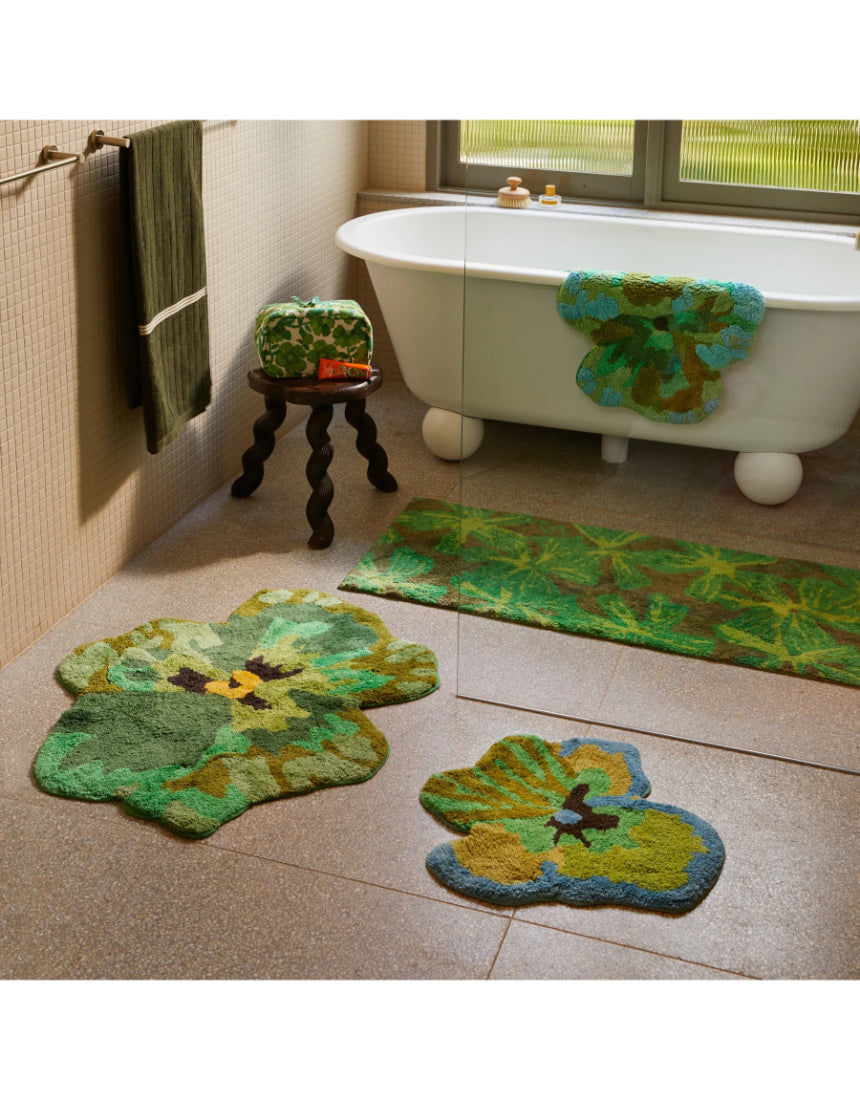 Bonnie and Neil Mave Khaki cotton bath mat with textured woven design, suitable for bathroom decor and comfort.