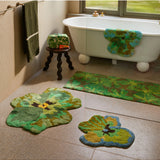 Bonnie and Neil Mave Khaki cotton bath mat with textured woven design, suitable for bathroom decor and comfort.